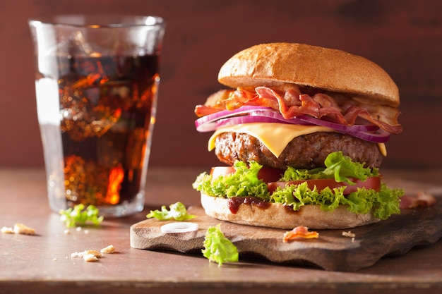 Bacon cheese burger with beef patty tomato onion cola