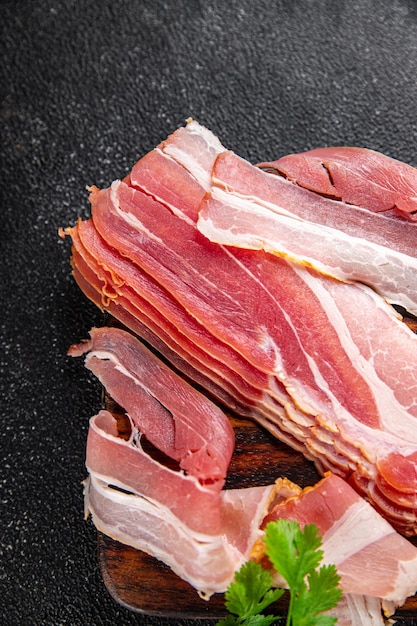 bacon slices smoked lard meat meal food snack on the table copy space food background rustic top