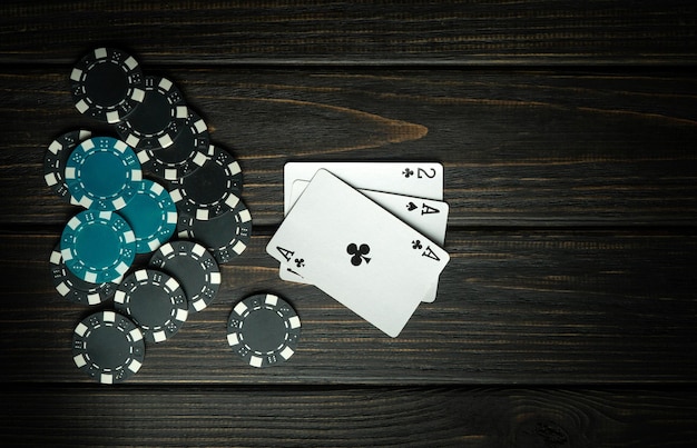 Bad combination of cards in a poker game Lose or go bankrupt in a card game Place for advertising on a black background