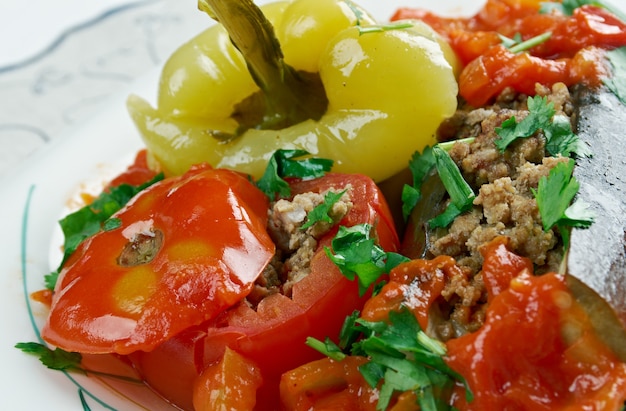 Badimcan, biber, pomidor dolmasi - Stuffed aubergines, peppers and tomatoes.popular dolma across Azerbaijan.