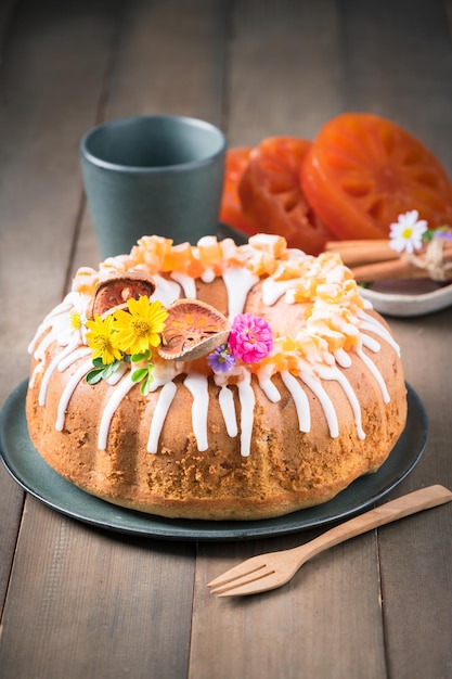 Bael Fruit Cake decorated with small flowers on top sweet and healthy dessert