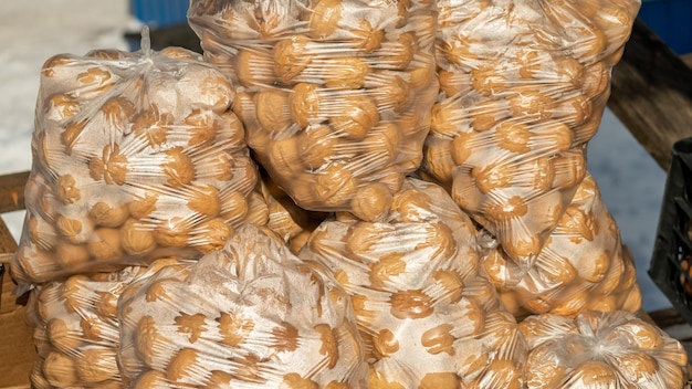 A bag of bag of potatoes is stacked on top of each other.