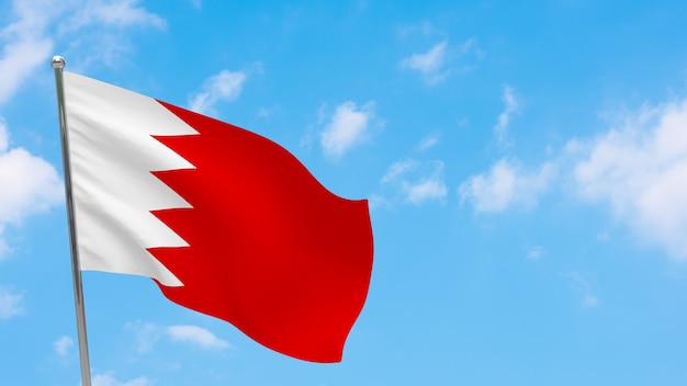 Bahrain flag on pole. Blue sky. National flag of Bahrain