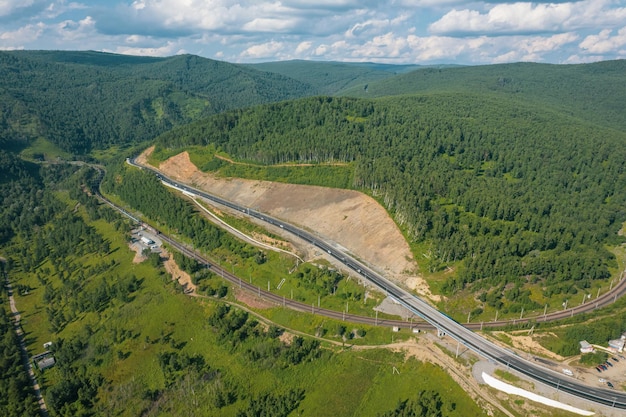 The Baikal serpentine road - aerial view of natural mountain valley with serpantine road, Trans-Siberian Highway, Russia, Kultuk, Slyudyanka