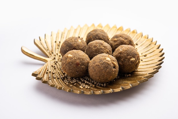 Bajra Atta Ladoo or kuler laddoo Millet Flour Laddu a popular winter sweet snack food from India