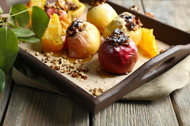 Baked apples on tray close up