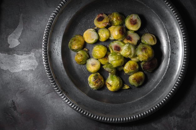 Baked Brussels sprouts in the metal plate