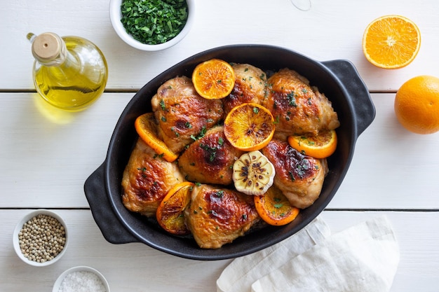 Baked chicken with oranges, garlic and mint. Recipe.