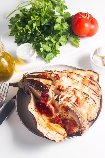 Baked cooked grilled eggplant with mozzarella cheese tomatoes Georgian cuisine