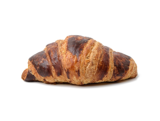 Baked croissant isolated on white, close up