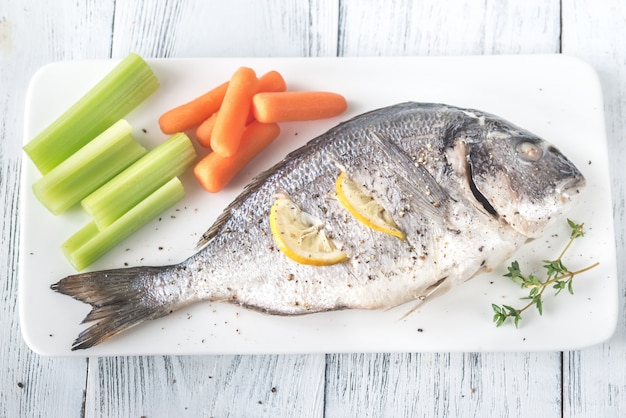 Baked dorada with fresh vegetables