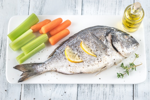 Baked dorada with fresh vegetables