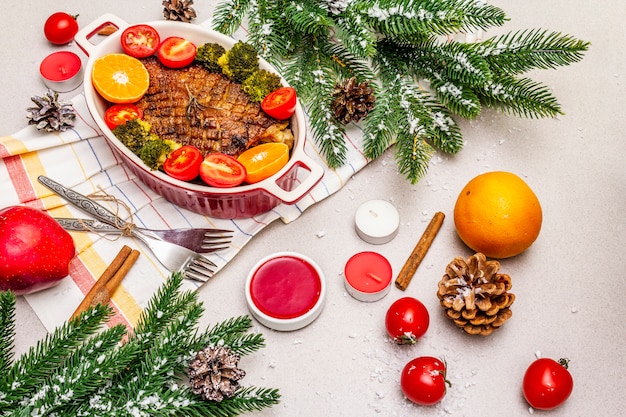 Baked duck breast with vegetables and sauce. Christmas dinner concept, New Year table setting.