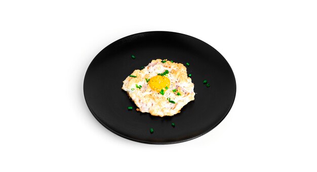 Baked eggs with parmesan and bacon isolated. Cloud eggs. Healthy breakfast..