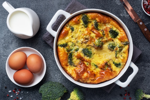 Baked omelet with broccoli on the table