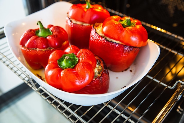 Baked pepper with minced meat and rice with the addition of mozzarella cheese