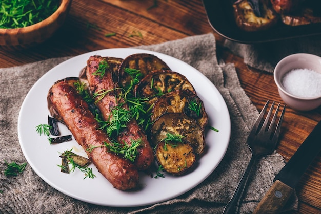 Baked Pork Sausages with Eggplant