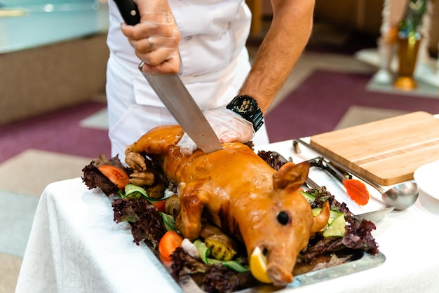 Baked pork shank with sauerkraut and beer on a wooden table German cuisine Oktovber recipe for festival banner menu recipe