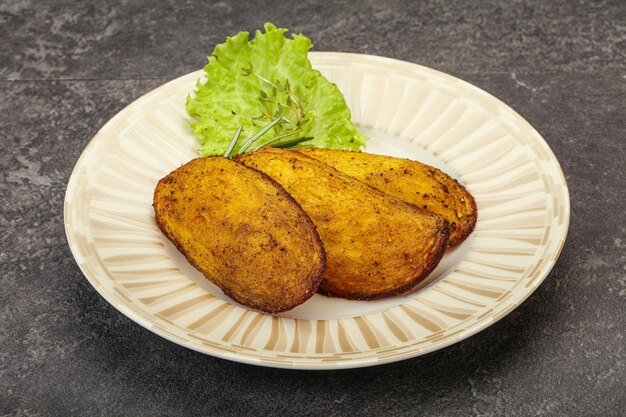 Baked potato with herbs and spices