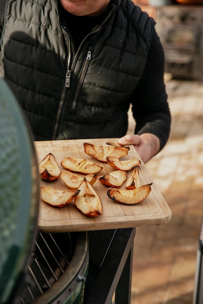 Baked quince on a wooden board