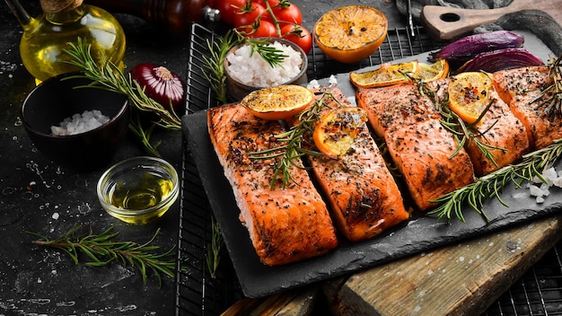 Baked Salmon with rosemary lemon and vegetables Recipe Seafood Side view Free space for text