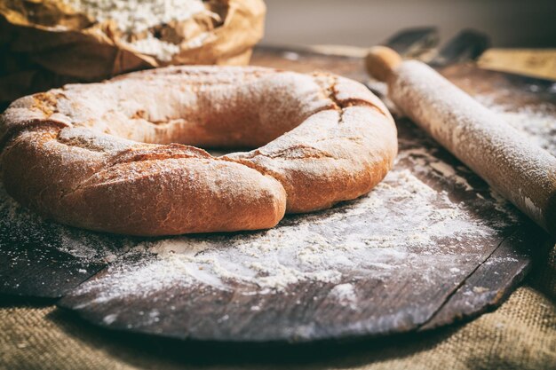 Baked sliced bread on a wooden surface