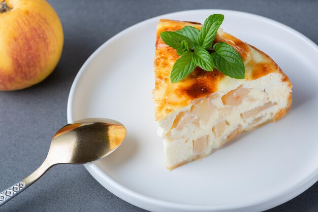 Baked Sweet Cottage Cheese casserole with apple decorated mint