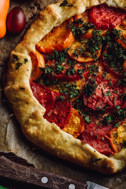 Baked tomato galette on baking paper