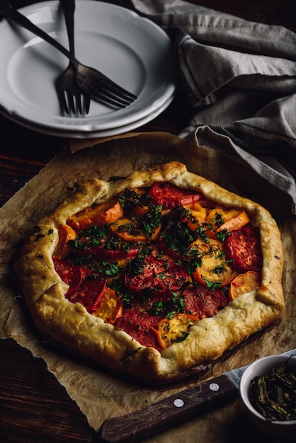 Baked tomato galette on baking paper