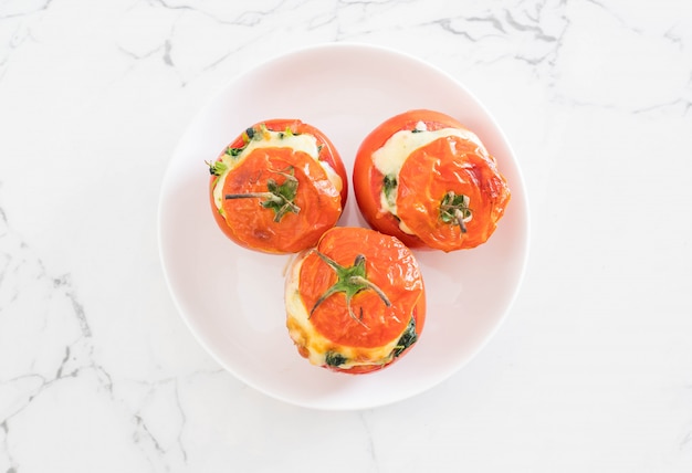  baked tomatoes stuffed with cheese and spinach 