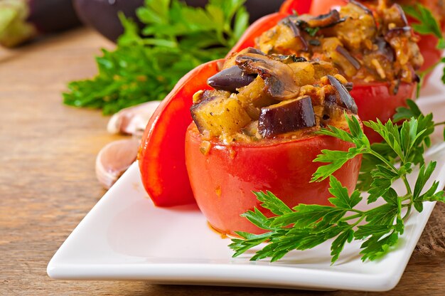 Baked tomatoes stuffed with eggplant and mushrooms