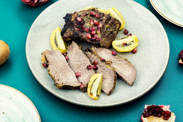 Baked veal meat on a plate