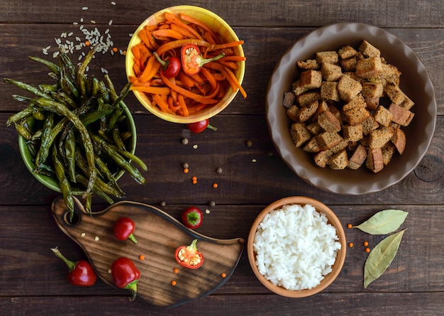 Baked vegetables with boiled rice and rye croutons