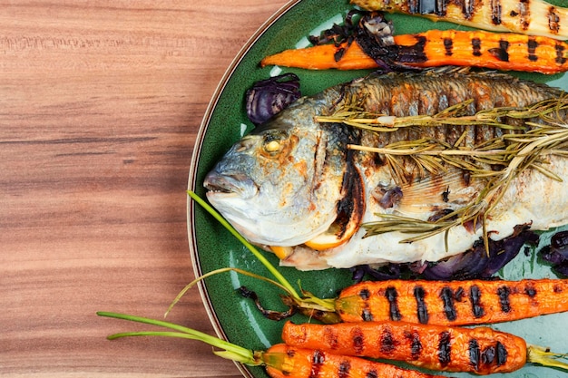 Baked whole dorado with BBQ vegetables