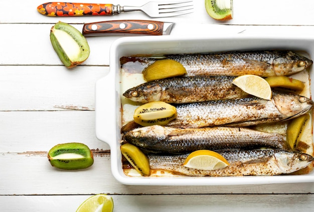 Baked whole fish with kiwi and lime