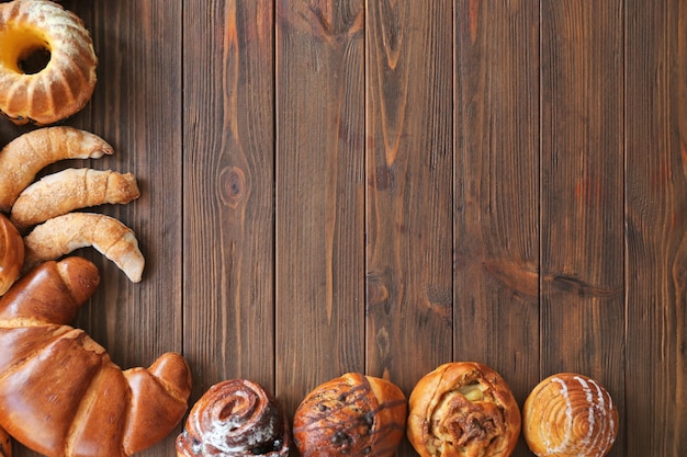 Bakery products on wooden background