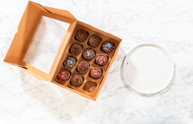 Baking chocolate cupcakes with decadent chocolate frosting