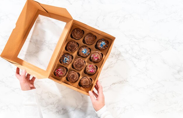 Baking chocolate cupcakes with decadent chocolate frosting