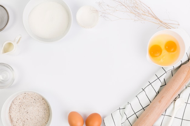 Baking ingredient arranged on white backdrop