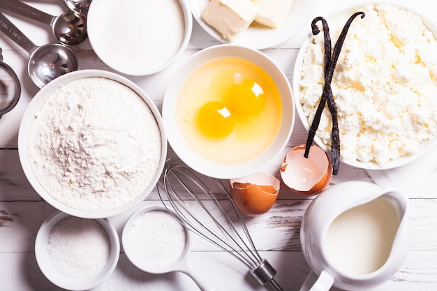 Baking ingredients for cottage cake on the table