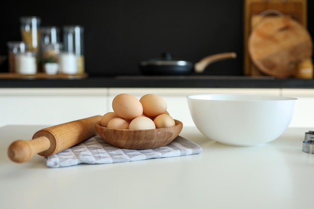 Baking ingredients placed on wooden table ready for cooking Copyspace for text Concept of food preparation kitchen on background