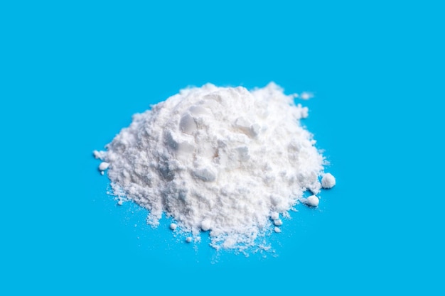 Baking soda on blue background