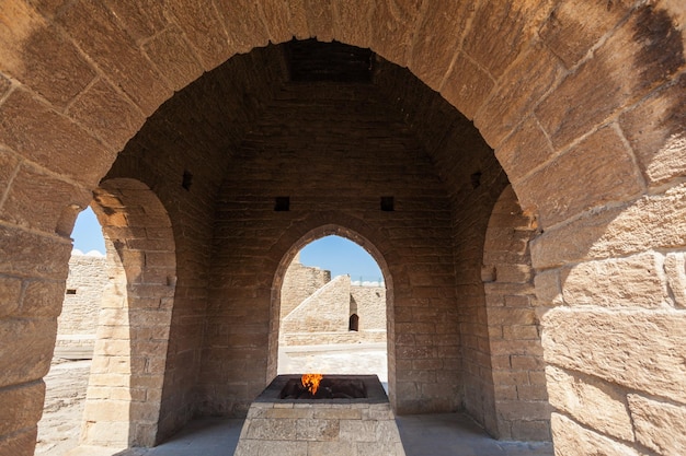 The Baku Ateshgah or Fire Temple of Baku is a temple in Surakhani near Baku, Azerbaijan. Based on Persian and Indian inscriptions, temple was used as a Hindu and Zoroastrian place of worship.