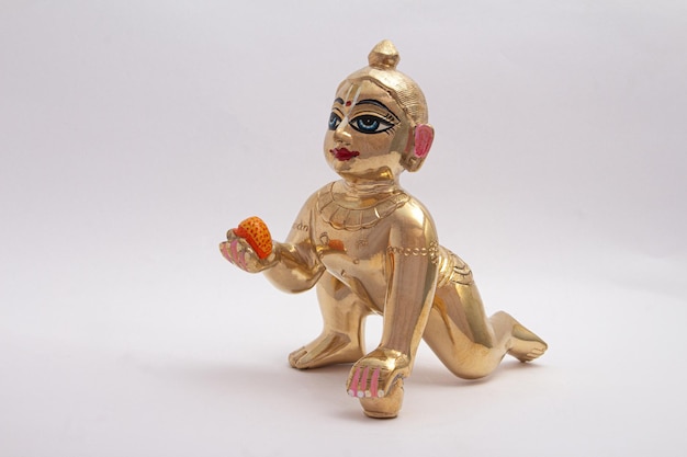 Bal Krishna Laddu Gopal Brass Statue side Facing White Background