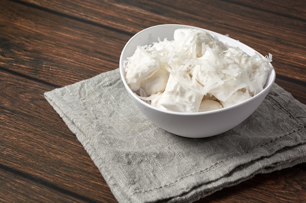 bala de coco, traditional brazilian dessert sweet made of coconut