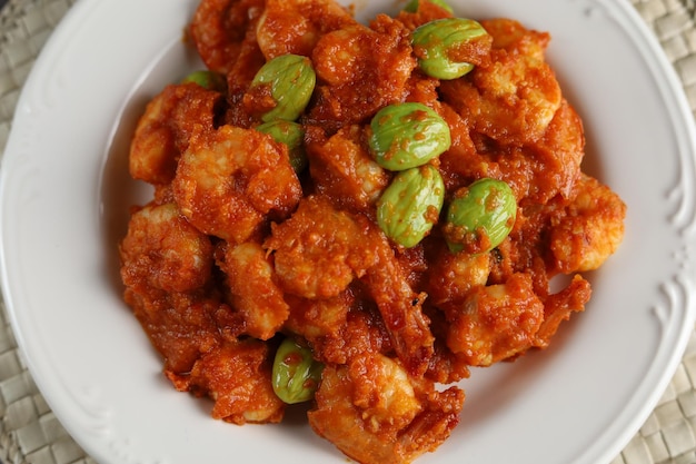 Balado udang Petai, traditional food made from petai, pete or mlanding (Parkia speciosa) with Shrimp