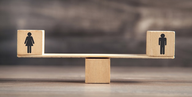 Balance scales made in from wooden cubes.