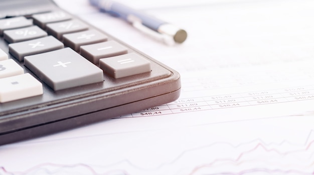 Balance sheet ,pencil, calculator on accountant's desk. Accounting , accounts concept. top view, above view.