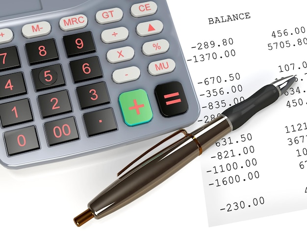 Balancing the accounts - calculator and pen on a financial statement page