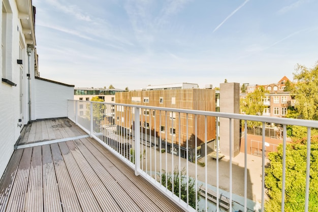 A balcony with a wooden floor and a wooden deck